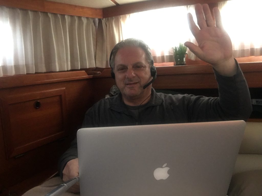 David remote working from home on our Boat