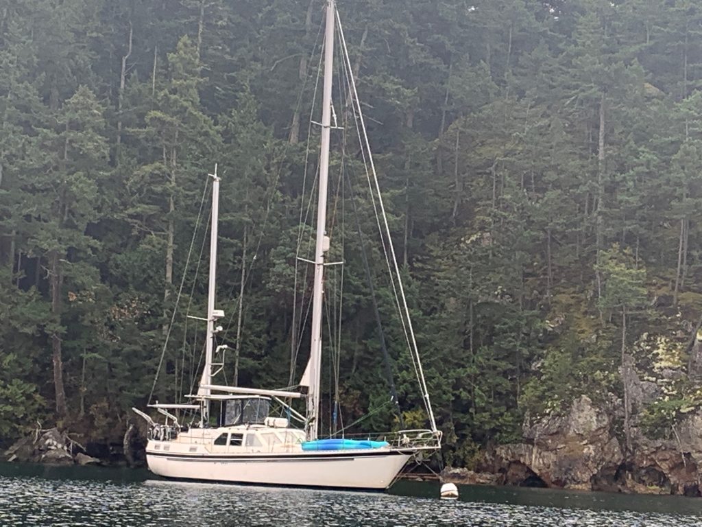 working from home in an idyllic anchorage on our boat